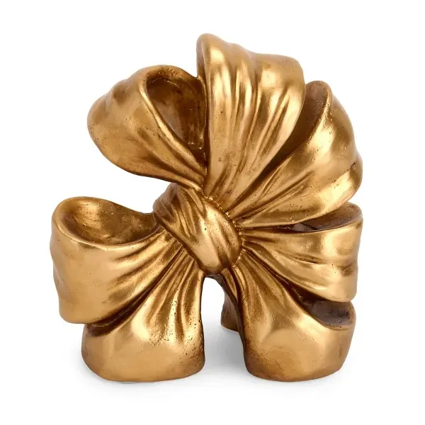Kirklands Gold Bow Resin Bookend 98537295 Kirklands Gold Bow Resin Bookend 98537295 - Image 1