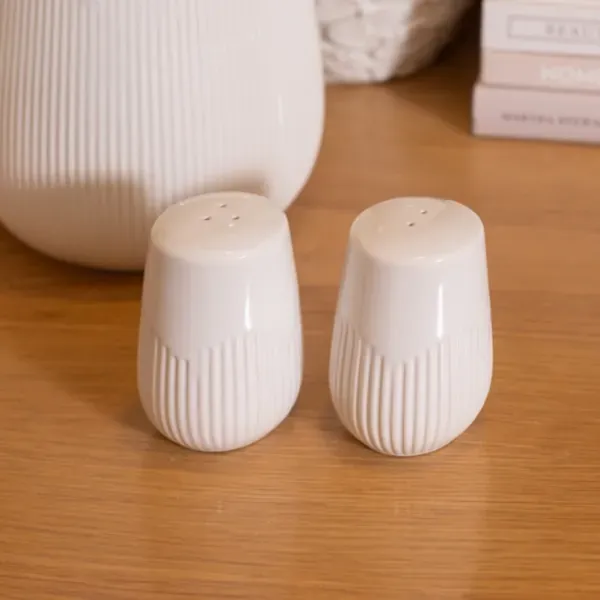 Kirklands White Ribbed Stoneware Salt and Pepper Shaker Set 62716639 Kirklands White Ribbed Stoneware Salt and Pepper Shaker Set 62716639 - Image 1